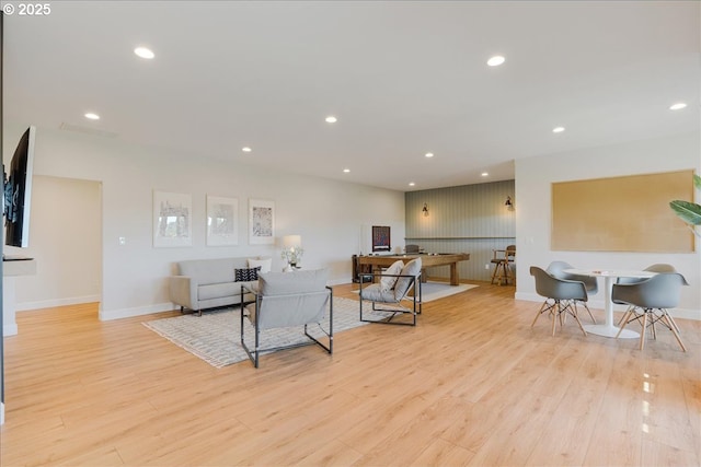23680 SW Robson Ter, Sherwood, OR 97140 - living room featuring light wood finished floors and recessed lighting