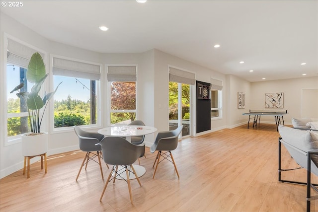 23680 SW Robson Ter, Sherwood, OR 97140 - dining room with healthy amount of natural light, recessed lighting, and light wood-style flooring
