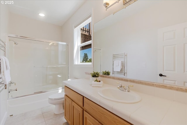 23680 SW Robson Ter, Sherwood, OR 97140 - full bath with vanity, tile patterned floors, and shower / bath combination with glass door
