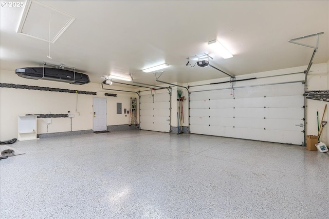 23680 SW Robson Ter, Sherwood, OR 97140 - garage with a garage door opener and electric panel