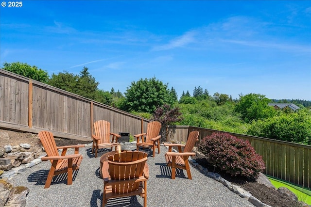 23680 SW Robson Ter, Sherwood, OR 97140 - fenced backyard featuring an outdoor fire pit and a patio