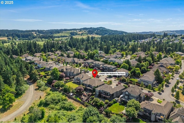 23680 SW Robson Ter, Sherwood, OR 97140 - aerial perspective of suburban area featuring a heavily wooded area
