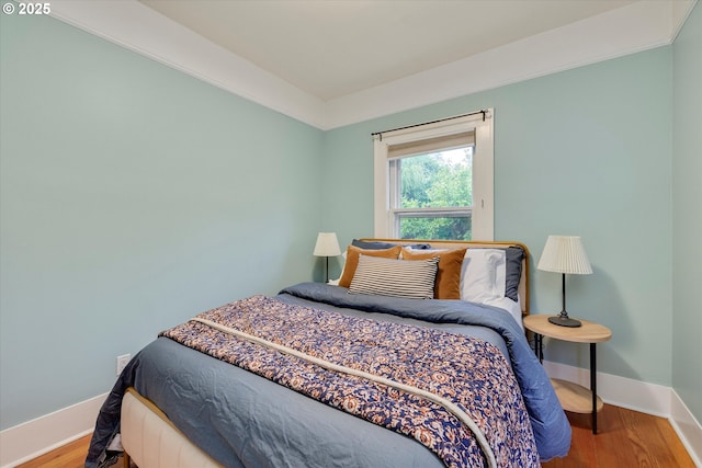 5851 NE 12th Ave, Portland, OR 97211 - bedroom featuring baseboards and wood finished floors
