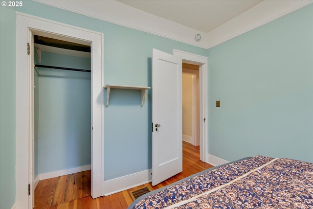 5851 NE 12th Ave, Portland, OR 97211 - bedroom featuring wood finished floors, a closet, and baseboards