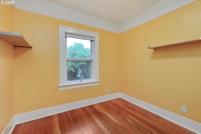 5851 NE 12th Ave, Portland, OR 97211 - spare room with baseboards and wood finished floors