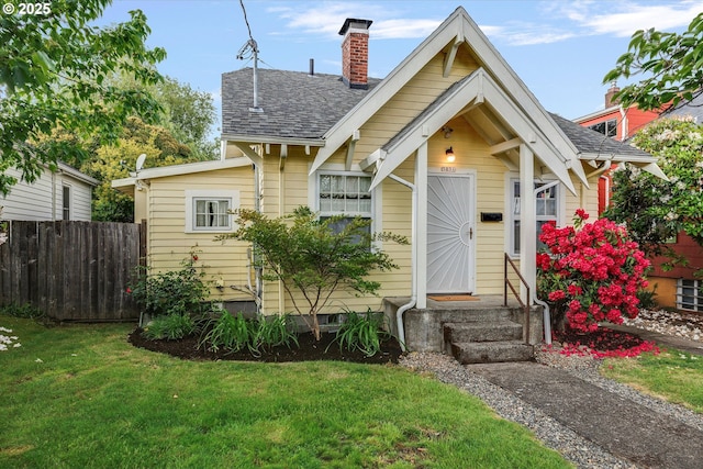 5851 NE 12th Ave, Portland, OR 97211 - bungalow featuring entry steps, a chimney, and a shingled roof