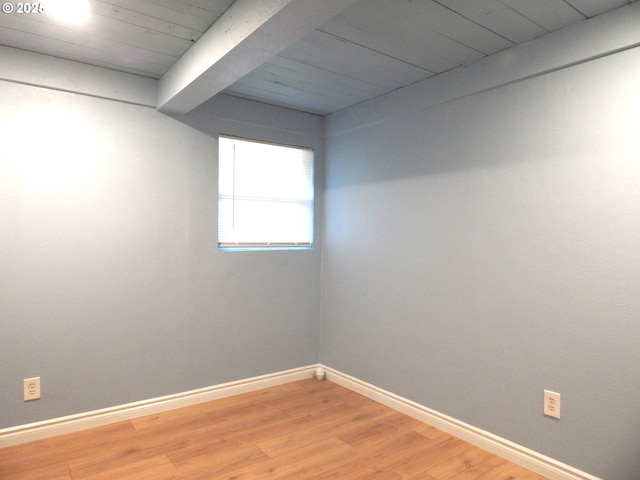 1582 N Ivy St, Coquille, OR 97423 - spare room featuring wood finished floors and baseboards