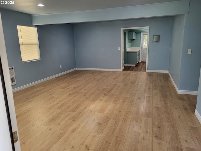 1582 N Ivy St, Coquille, OR 97423 - unfurnished room featuring light wood-type flooring, baseboards, and heating unit