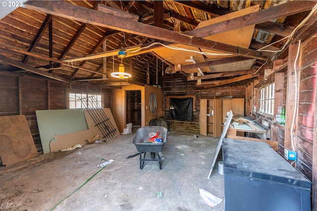 miscellaneous room featuring lofted ceiling