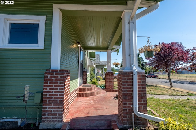 view of patio / terrace featuring central AC unit and a porch