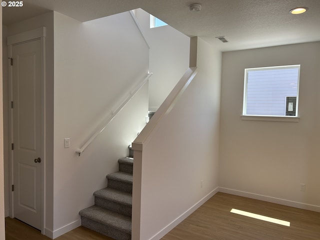 2940 Olympic St Unit 21, Woodburn, OR 97071 - stairs with wood finished floors, baseboards, and recessed lighting