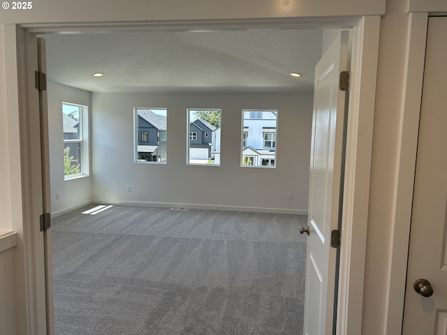 2940 Olympic St Unit 21, Woodburn, OR 97071 - carpeted empty room featuring baseboards, plenty of natural light, and recessed lighting