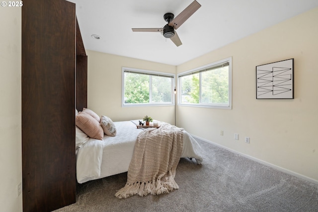 bedroom featuring carpet flooring, baseboards, and ceiling fan