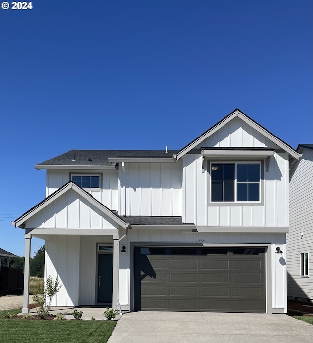 view of front of property featuring a garage