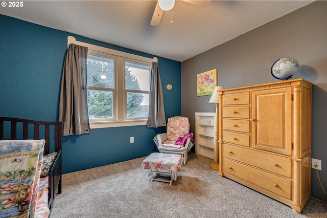 carpeted bedroom featuring a ceiling fan