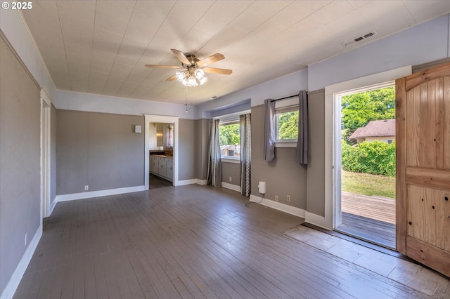 470 W 4th St, Coquille, OR 97423 - unfurnished room with a ceiling fan, hardwood / wood-style flooring, and baseboards