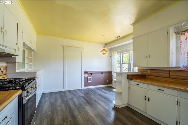 470 W 4th St, Coquille, OR 97423 - kitchen with stainless steel range with gas cooktop, under cabinet range hood, dark wood finished floors, open shelves, and crown molding