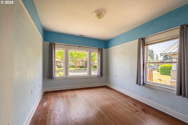 470 W 4th St, Coquille, OR 97423 - spare room with hardwood / wood-style flooring and baseboards