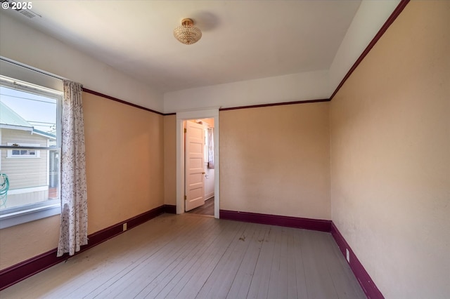 470 W 4th St, Coquille, OR 97423 - spare room featuring hardwood / wood-style flooring and baseboards