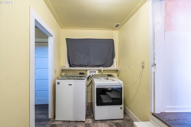 470 W 4th St, Coquille, OR 97423 - laundry area featuring washing machine and clothes dryer and ornamental molding
