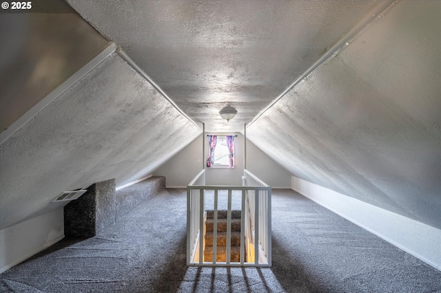470 W 4th St, Coquille, OR 97423 - bonus room featuring carpet, a textured ceiling, and lofted ceiling