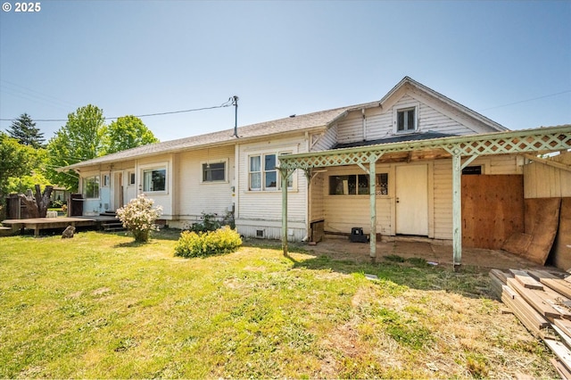 470 W 4th St, Coquille, OR 97423 - rear view of house with a lawn and crawl space
