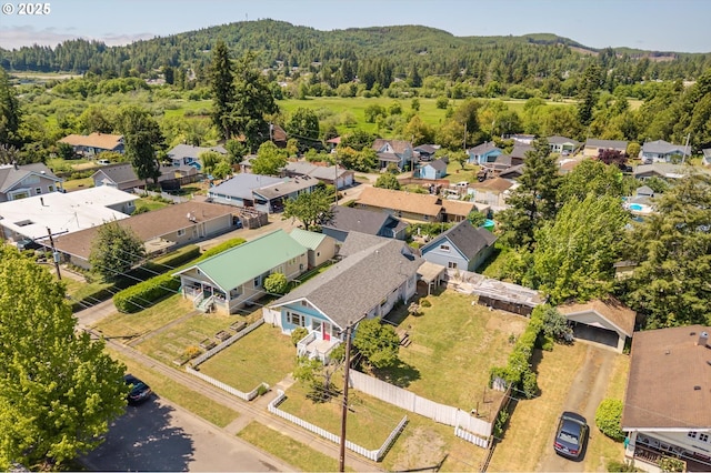 470 W 4th St, Coquille, OR 97423 - aerial view of residential area with a forest