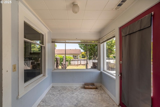 470 W 4th St, Coquille, OR 97423 - unfurnished sunroom featuring baseboards