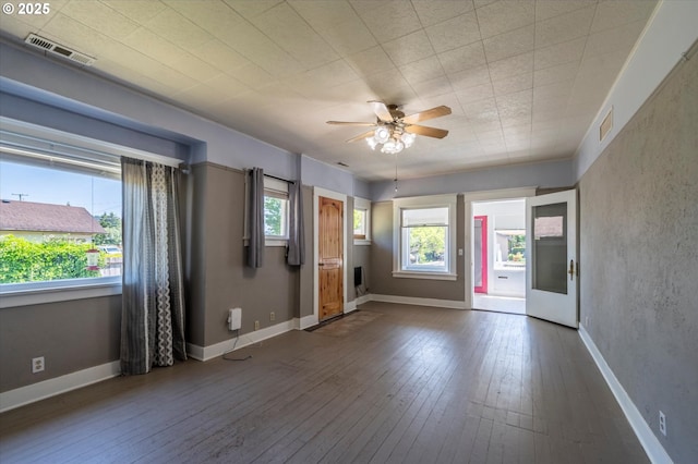 470 W 4th St, Coquille, OR 97423 - empty room featuring a ceiling fan and hardwood / wood-style flooring