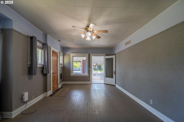 470 W 4th St, Coquille, OR 97423 - spare room with a ceiling fan, hardwood / wood-style floors, and baseboards
