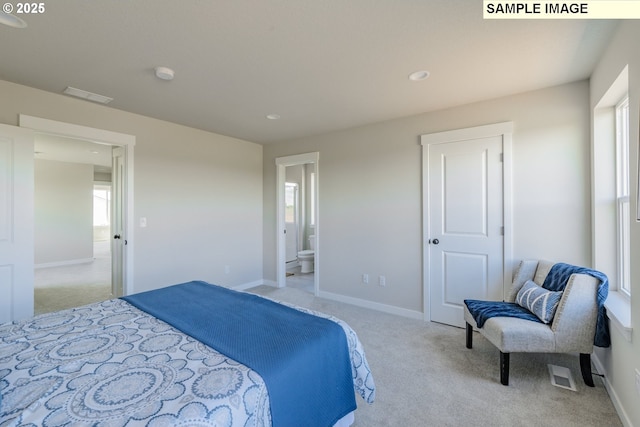 2216 Statesman Dr Lot 46, Woodland, WA 98674 - bedroom with light carpet, recessed lighting, ensuite bath, baseboards, and a sink