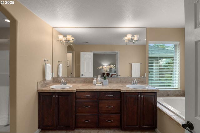 5392 NW 133rd Ave, Portland, OR 97229 - full bath featuring a chandelier, double vanity, and a garden tub