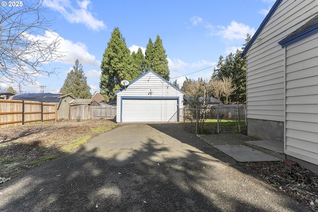 detached garage with fence