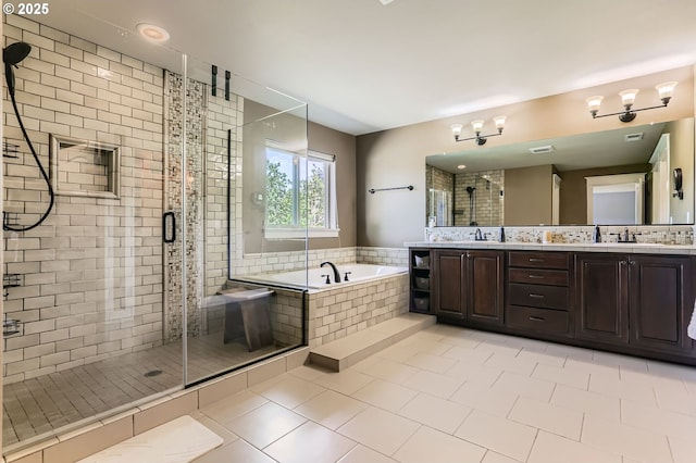 10183 NW Crossing Dr, Portland, OR 97229 - bathroom featuring a bath, double vanity, a shower stall, and tile patterned flooring