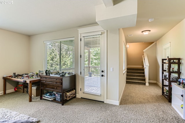 10183 NW Crossing Dr, Portland, OR 97229 - carpeted bedroom with access to outside and baseboards