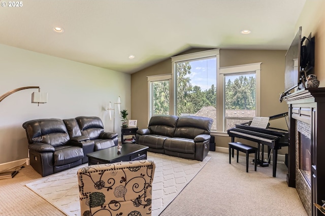 10183 NW Crossing Dr, Portland, OR 97229 - living room featuring vaulted ceiling, light carpet, a glass covered fireplace, recessed lighting, and baseboards