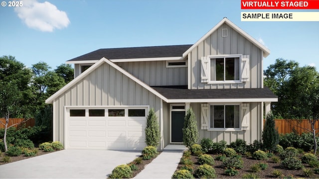 view of front of house featuring a garage, board and batten siding, and fence