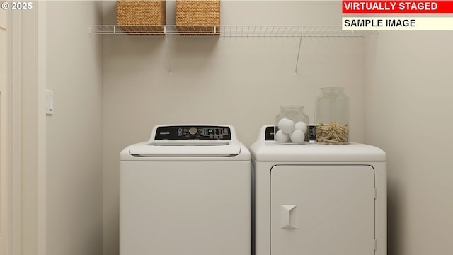 laundry room with washer and dryer