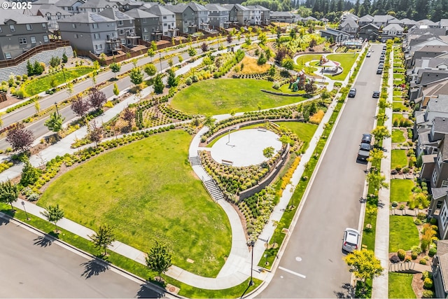 birds eye view of property with a residential view