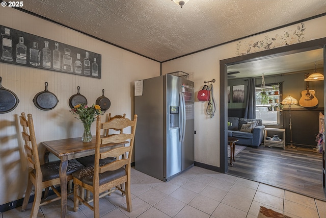 1646 E Gibbs Ave, Cottage Grove, OR 97424 - dining area with a textured ceiling and light tile patterned flooring