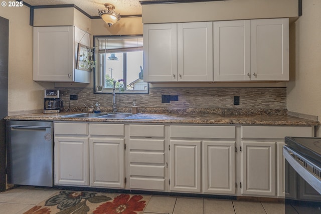 1646 E Gibbs Ave, Cottage Grove, OR 97424 - kitchen with range with electric stovetop, light tile patterned floors, dishwasher, and white cabinets