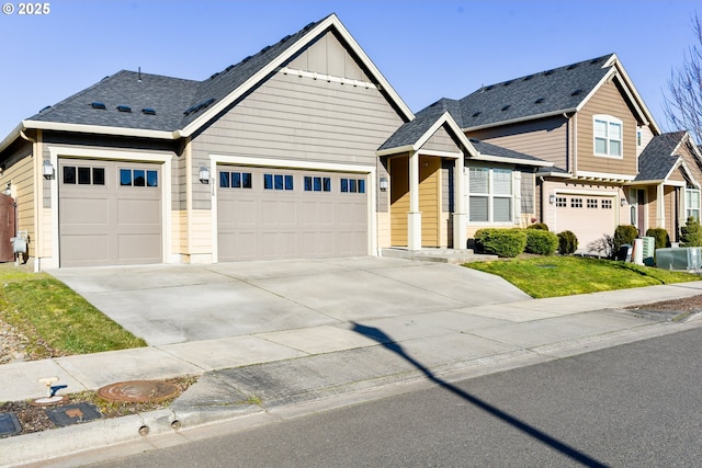 craftsman-style house featuring a garage