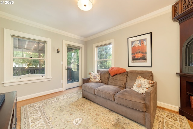 4052 NE 22nd Ave, Portland, OR 97212 - living area featuring wood finished floors and crown molding
