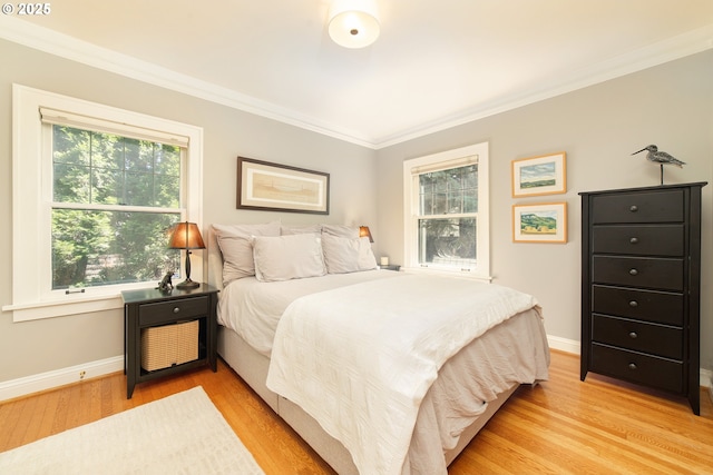 4052 NE 22nd Ave, Portland, OR 97212 - bedroom featuring ornamental molding and light wood-style floors