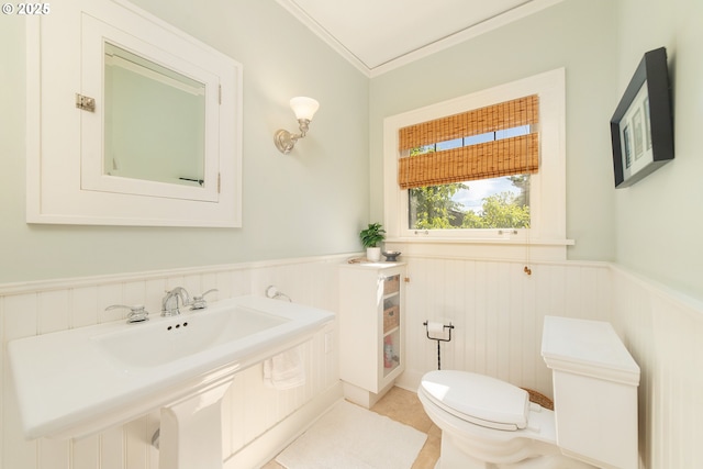 4052 NE 22nd Ave, Portland, OR 97212 - bathroom featuring a wainscoted wall and crown molding