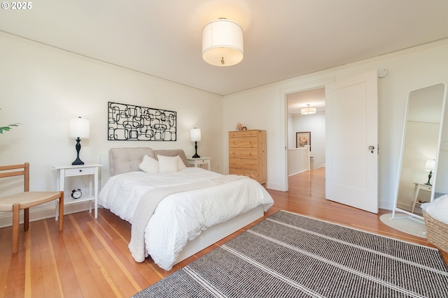 4052 NE 22nd Ave, Portland, OR 97212 - bedroom featuring light wood finished floors and baseboards