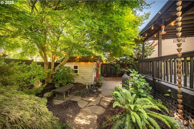4052 NE 22nd Ave, Portland, OR 97212 - fenced backyard with a storage shed and a patio