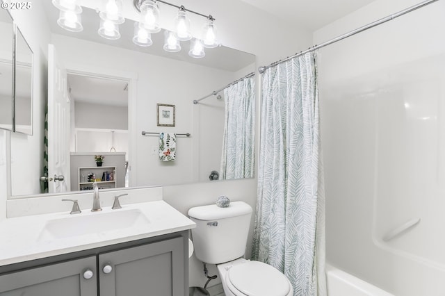 full bath featuring shower / tub combo, toilet, and vanity