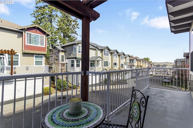 balcony featuring a residential view