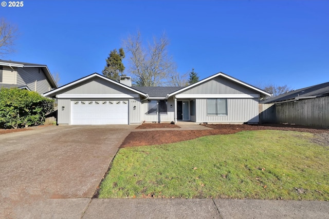 ranch-style home with a garage and a front lawn